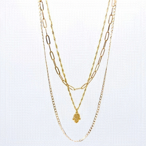 THREE layered necklaces with gold hamsa pendant.